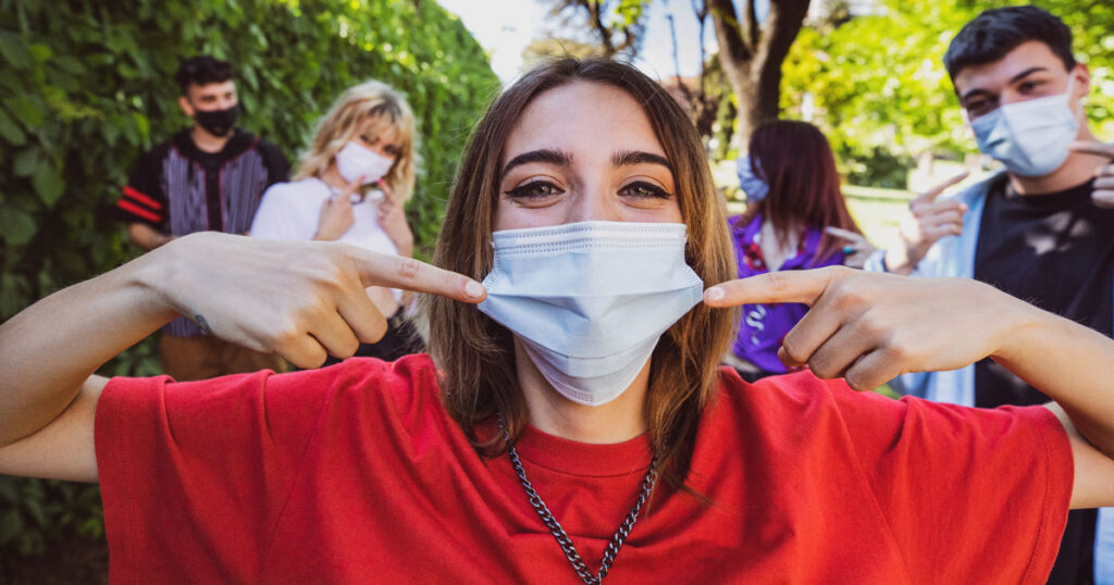 Photo of woman wearing mask